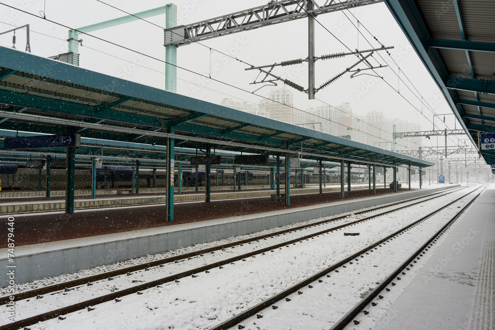 Snow over train station in korea.