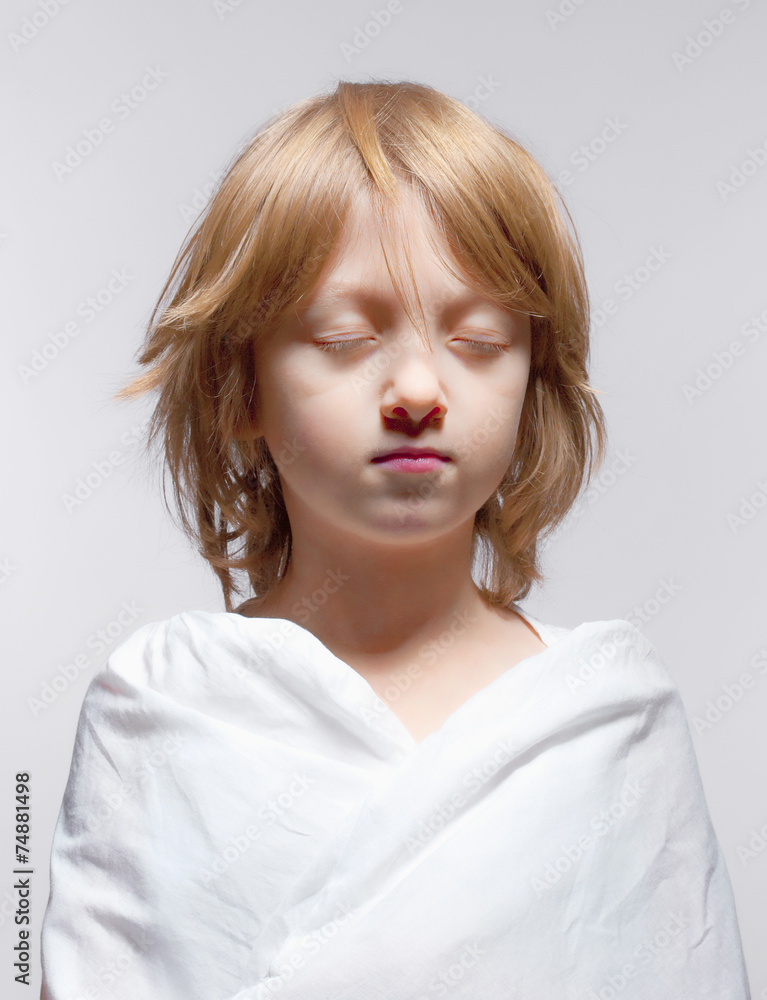 Portrait of a Boy with Closed Eyes - Isolated on Gray Portrait of a Boy with Closed Eyes - Isolated on Gray