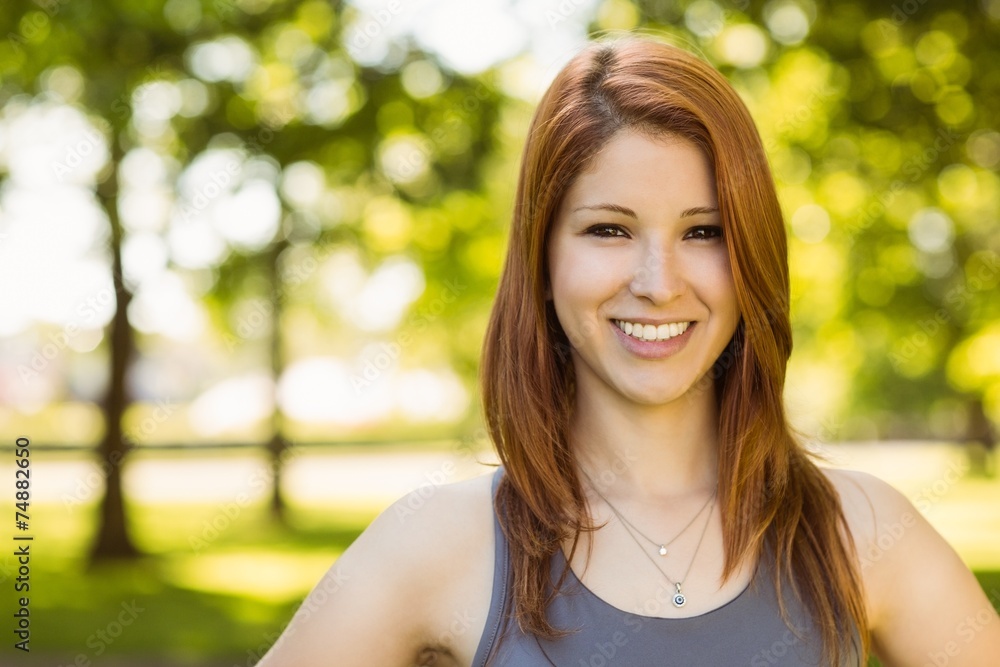 Portrait of a pretty redhead smiling