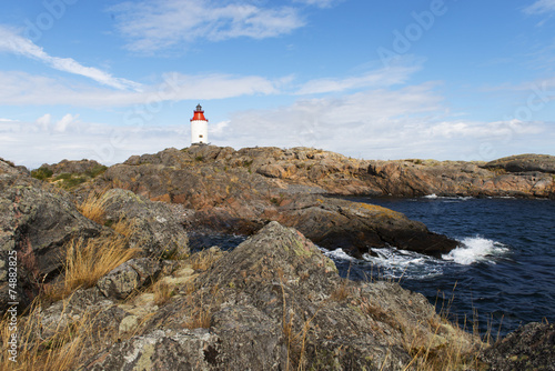 Red lighthouse on the small island in front of Smughen 