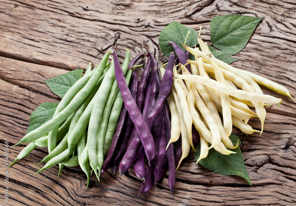 Fresh green beans on the old wooden table. Fresh green beans on the old wooden table.
