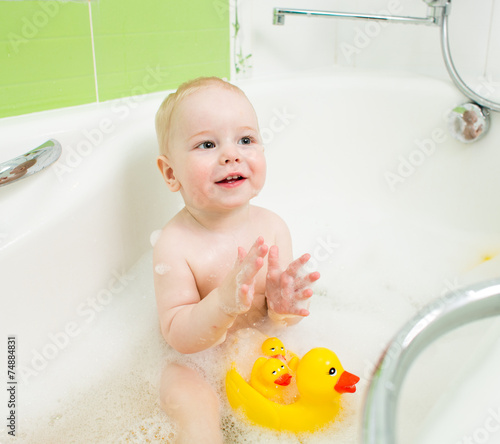 baby boy clapping hands and...