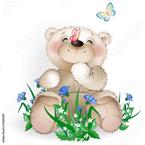 Happy Teddy bear sits in a meadow flowers1 photo