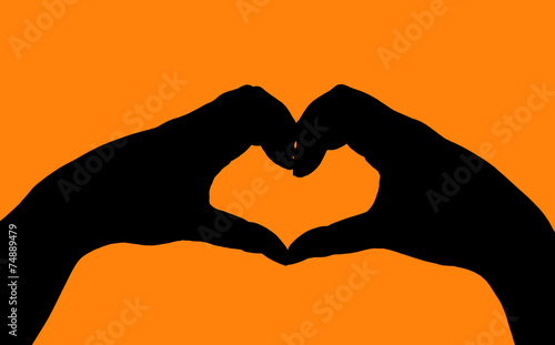 silhouette hand in heart shape