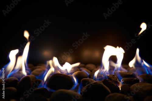 Close Up Of Flaming Coals On Gas Fire