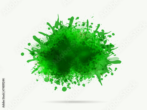Green color splash on grey background.