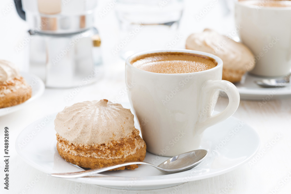 cup of espresso and cakes for breakfast on table cup of espresso and cakes for breakfast on table
