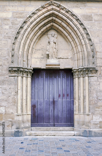 Portal in romanesque church in Reims  France.