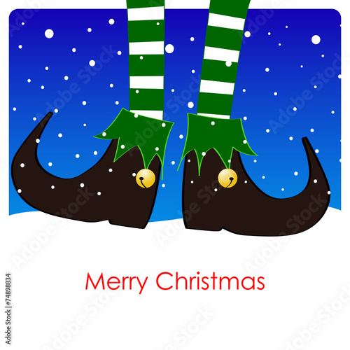 christmas greeting card, green elf's legs under a soft snowfall