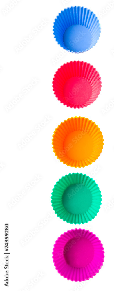 Cupcake silicone baking cups over white background Cupcake silicone baking cups over white background