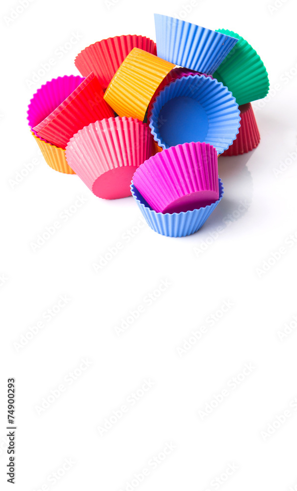Cupcake silicone baking cups over white background Cupcake silicone baking cups over white background
