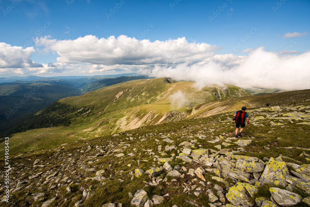 Hiker at Fagaras Mountains, Southern Carpathians, Romania