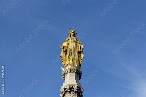 Golden angel on column