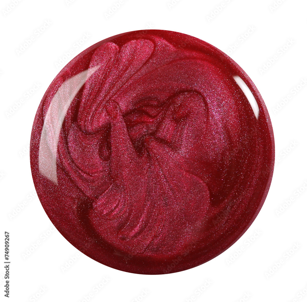 Closeup of a nail polish droplet isolated on white Closeup of a nail polish droplet isolated on white