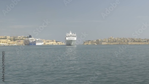 Cruise ship is maneuvering in Valletta, Malta