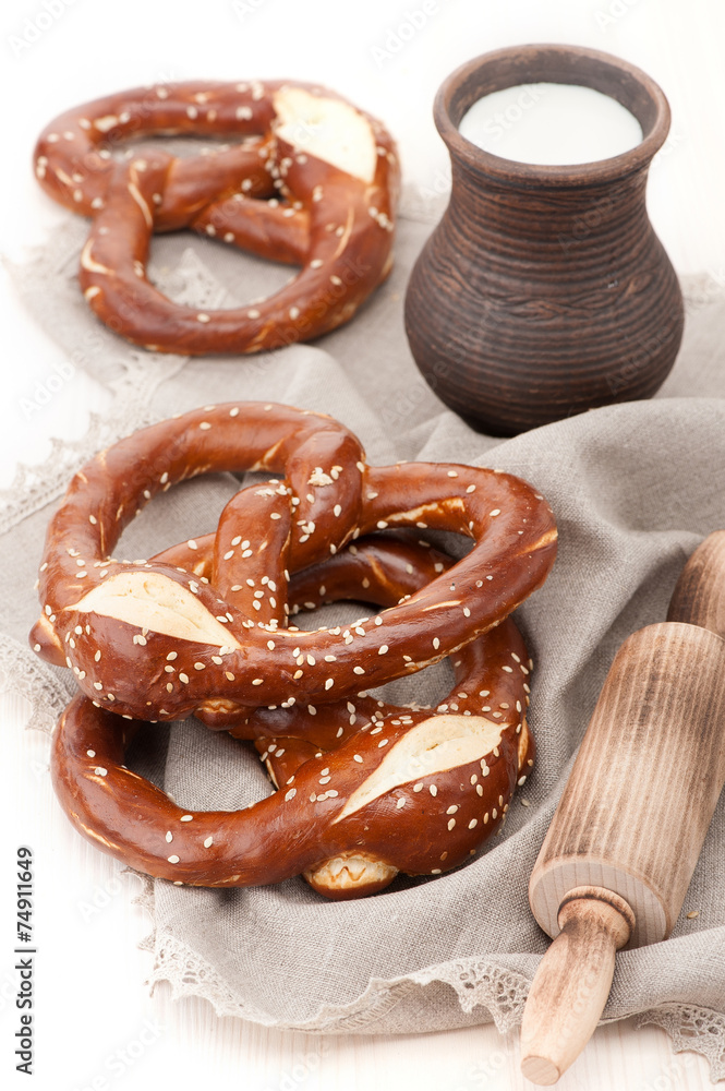 Pretzels with milk in a rustic style Pretzels with milk in a rustic style