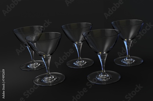 Martini glasses on a dark background, crystal.