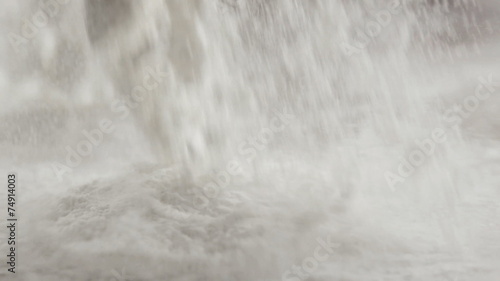 Scattered dry flour on a kitchen counter top