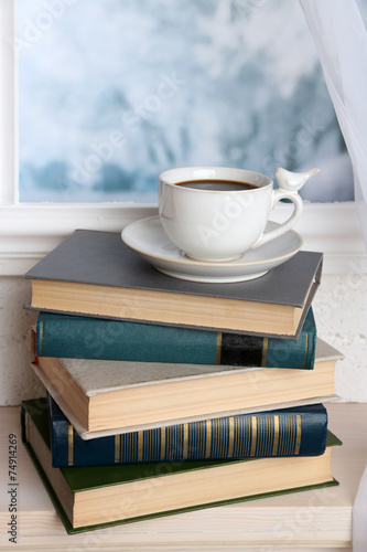 Composition of books and cup