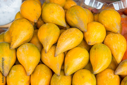 Egg fruit or Canistel on sale stand photo
