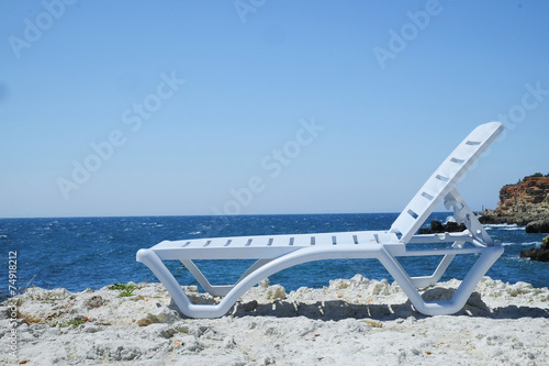 chaise longue at a sea beach