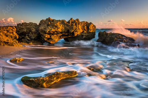 Waves and coral at sunrise in the Atlantic Ocean at Coral Cove P photo