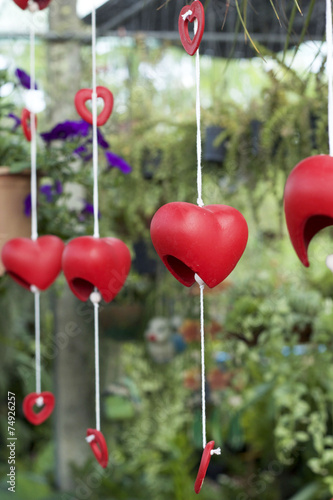 Red heart decorative in garden © seagames50