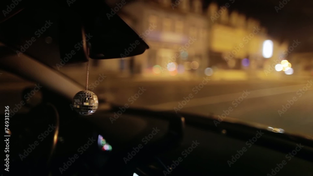 Disco ball hanging in the car Disco ball hanging in the car