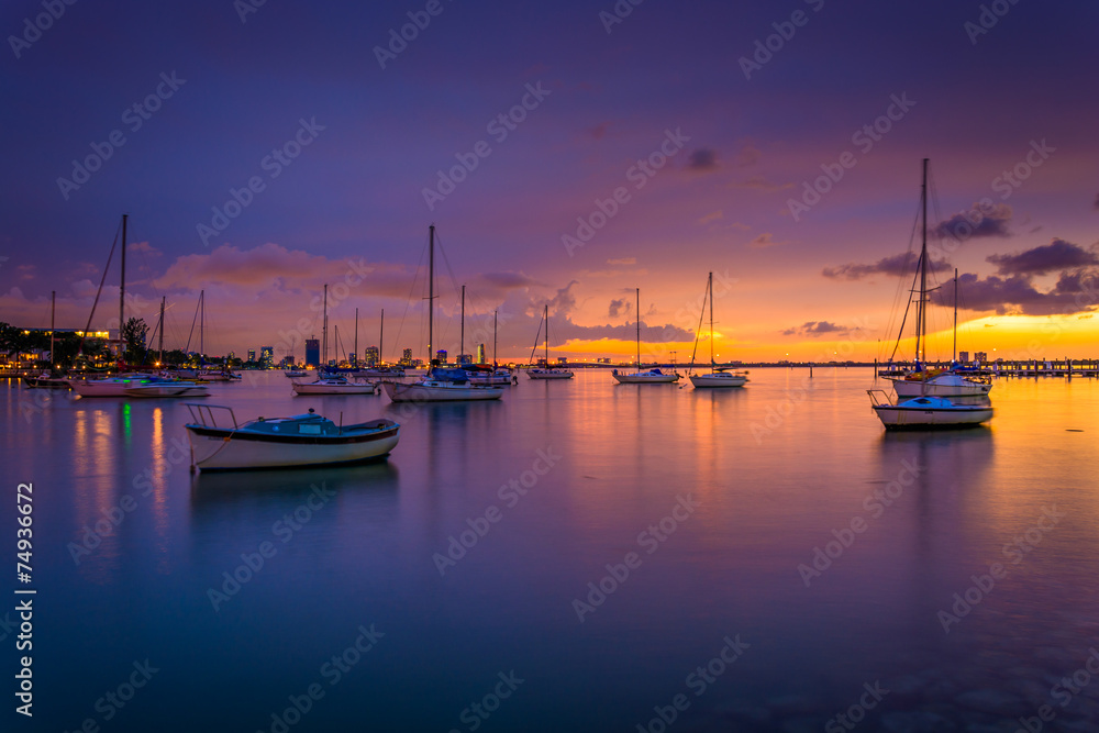 Boats in Biscayne Bay at sunset, seen from Miami Beach, Florida.