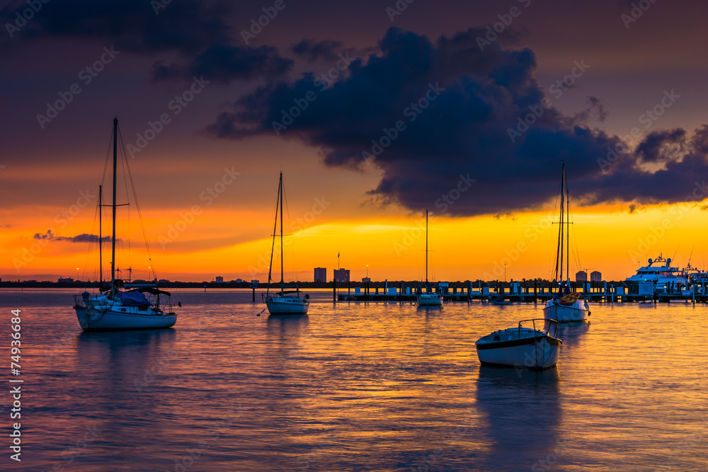 Boats in Biscayne Bay at sunset, seen from Miami Beach, Florida.