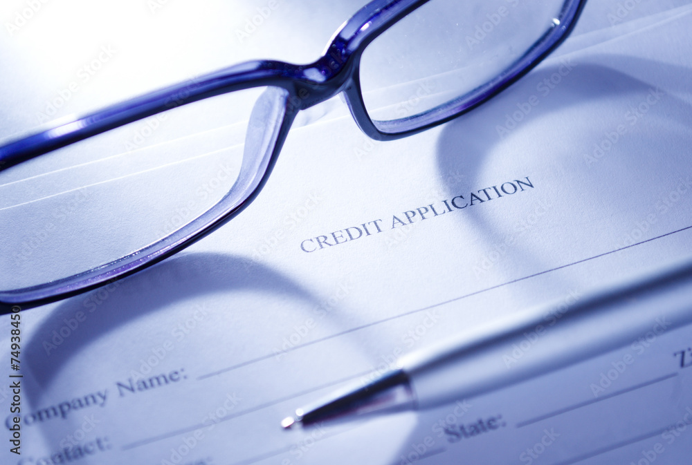 Eyeglasses and Pen on Top of Application Form Eyeglasses and Pen on Top of Application Form