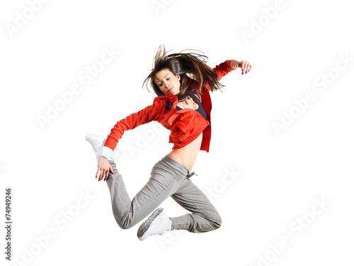 Modern hip-hop style teenage girl jumping