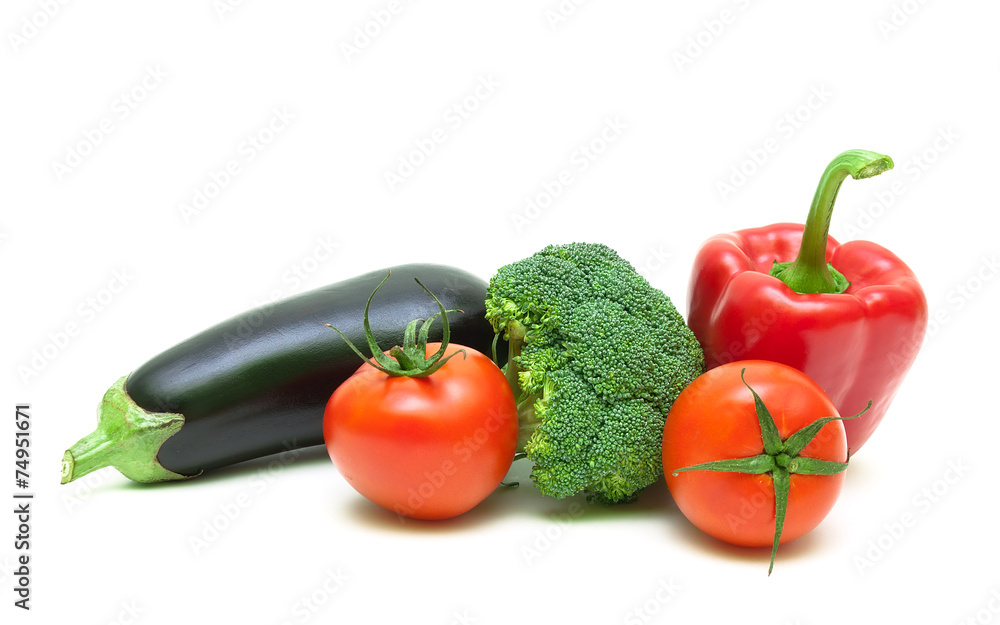 broccoli, eggplant, cherry tomatoes and red pepper on white back broccoli, eggplant, cherry tomatoes and red pepper on white back