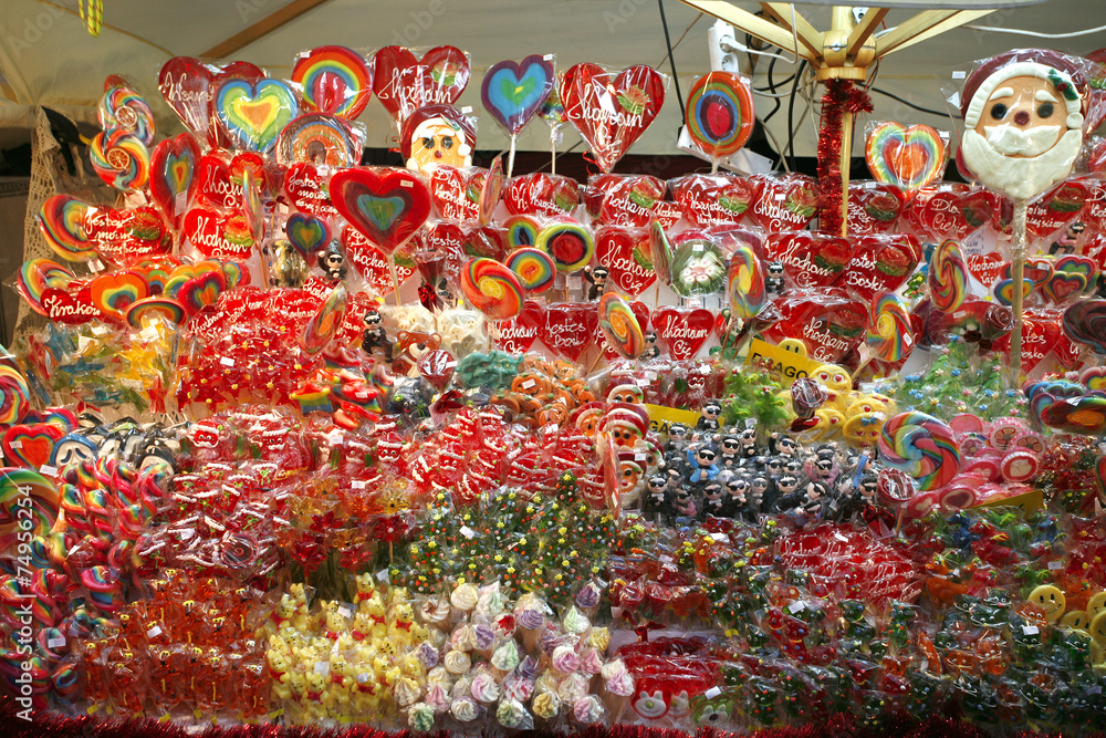 Colorful sweets candies and lollipops at christmas market Cracov