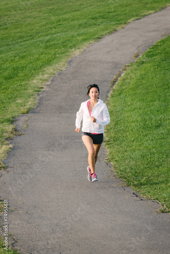 Woman running in park