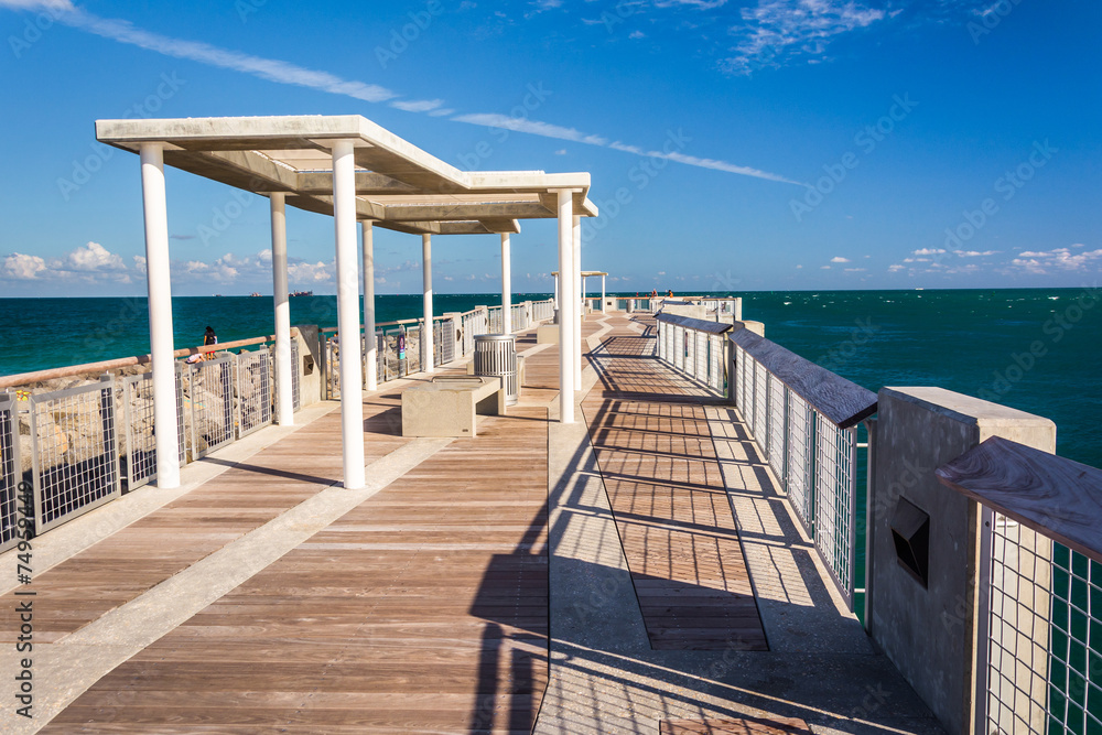 Fishing pier at South Pointe Park in Miami Beach, Florida. Fishing pier at South Pointe Park in Miami Beach, Florida.