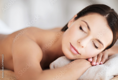 beautiful woman with closed eyes in spa