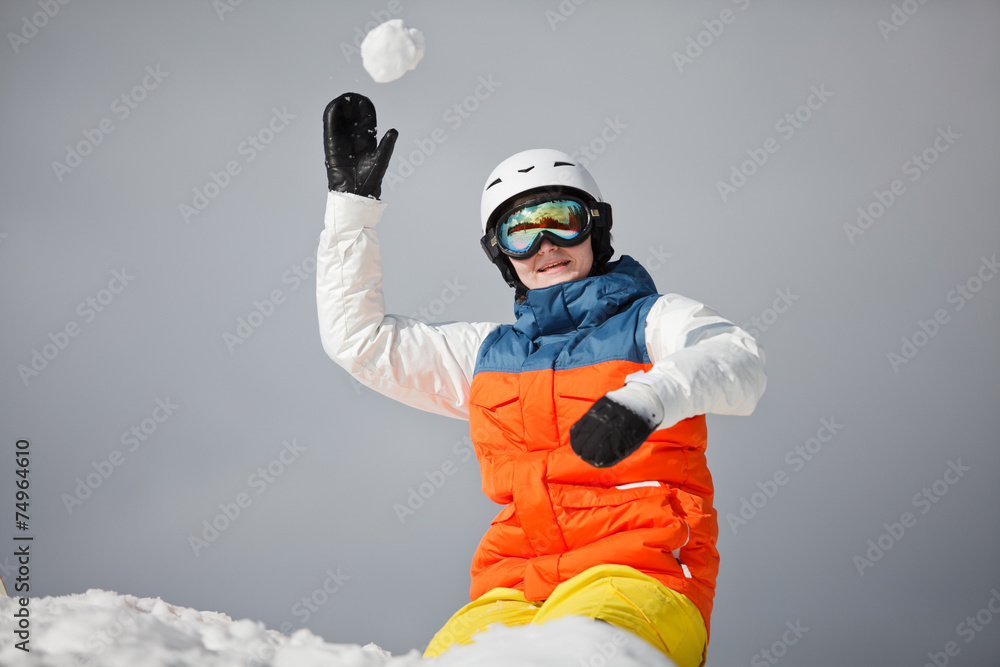 Young Woman Playing with snow