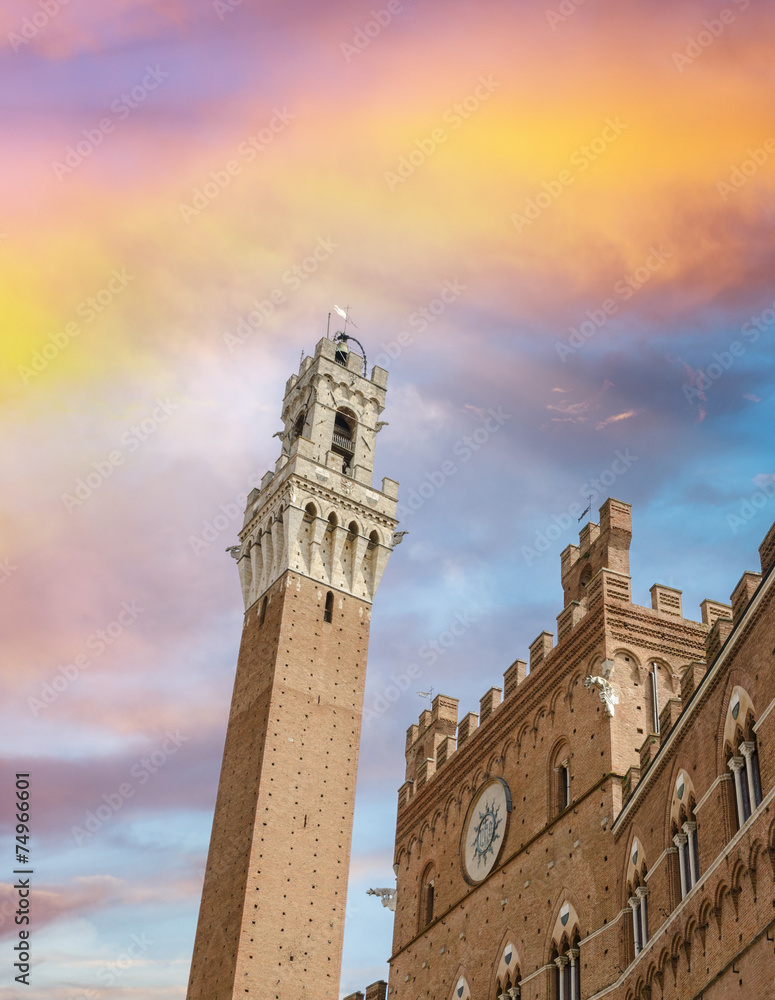 Fototapeta premium Siena. Mangia Tower in Campo Square at dusk