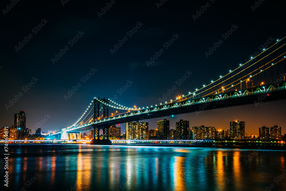 Manhattan Bridge at night, seen from Brooklyn Bridge Park, in Br Manhattan Bridge at night, seen from Brooklyn Bridge Park, in Br