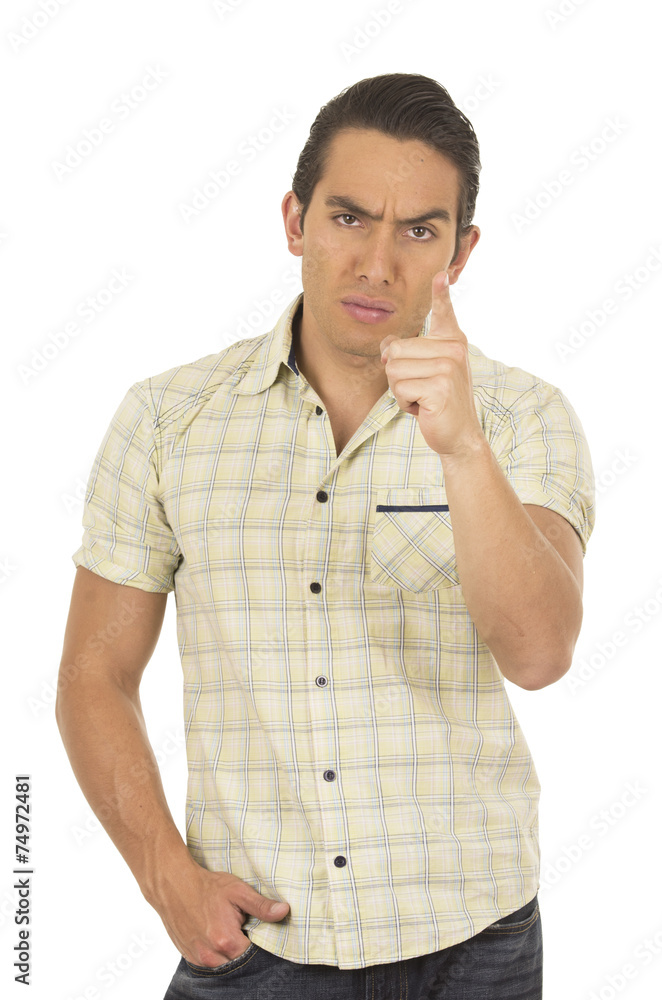 young handsome hispanic man posing giving a warning young handsome hispanic man posing giving a warning
