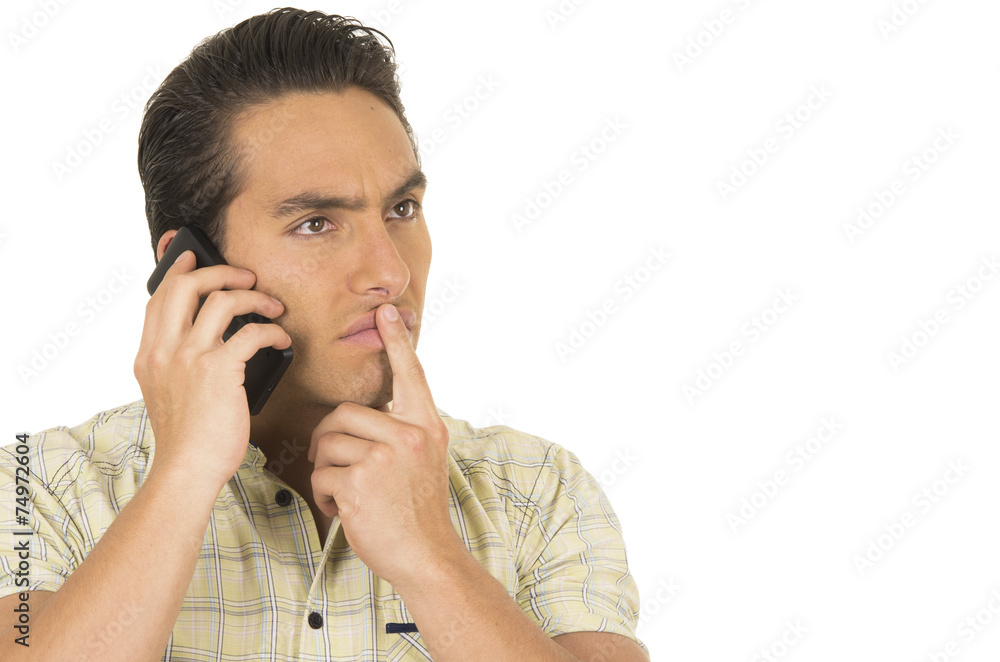 young handsome hispanic man posing using cell phone young handsome hispanic man posing using cell phone
