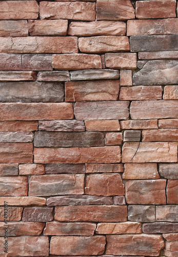 Pattern of old red stone Wall
