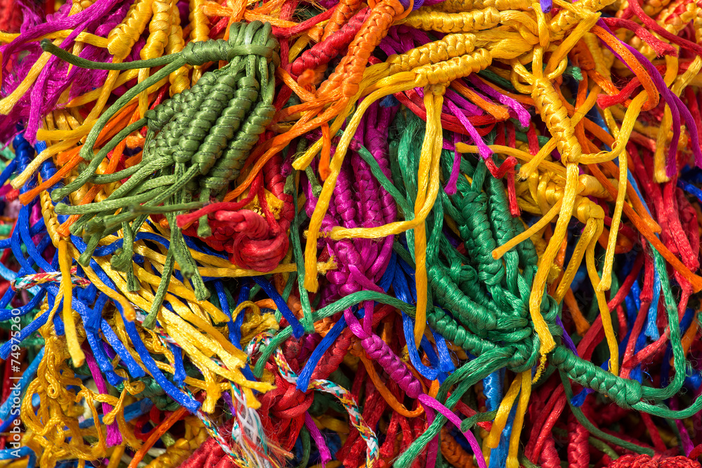 Colorful wicker bracelets on buddhist market. Dharamsala, India