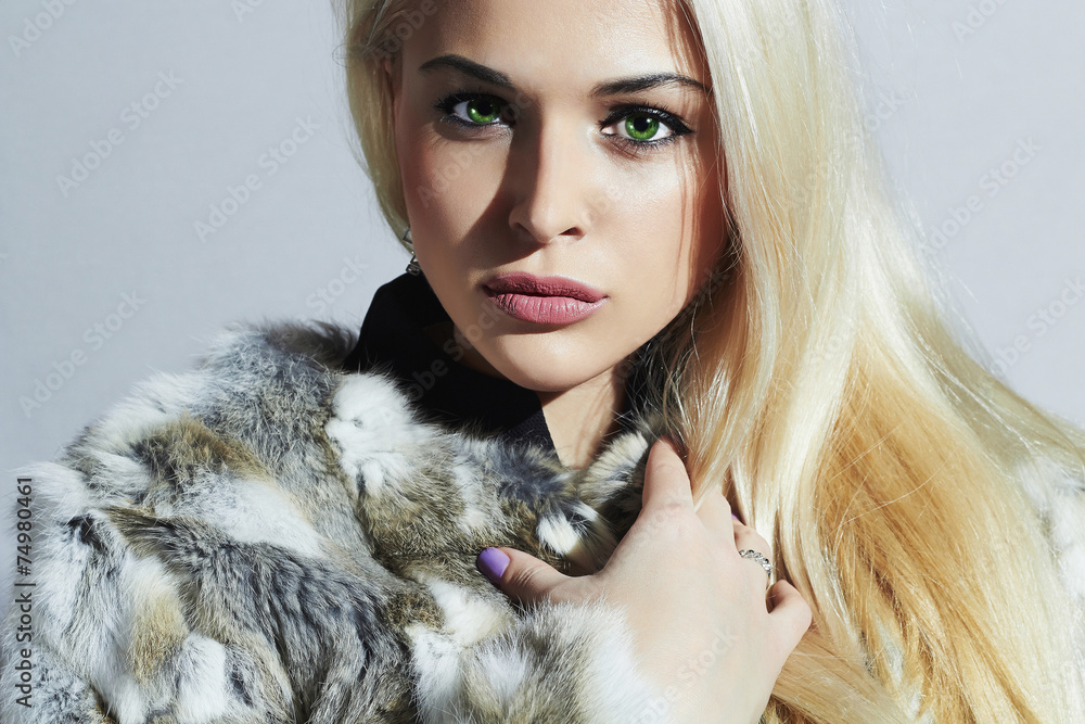 Beautiful blond woman in fur.winter fashion.Beauty Girl Beautiful blond woman in fur.winter fashion.Beauty Girl