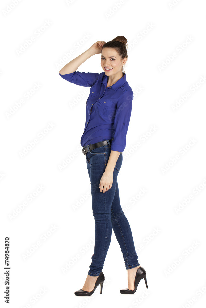Portrait of a beautiful woman in blue jeans and blue shirt Portrait of a beautiful woman in blue jeans and blue shirt