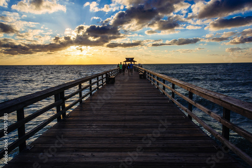 Sunset over the fishing pier in Naples  Florida.