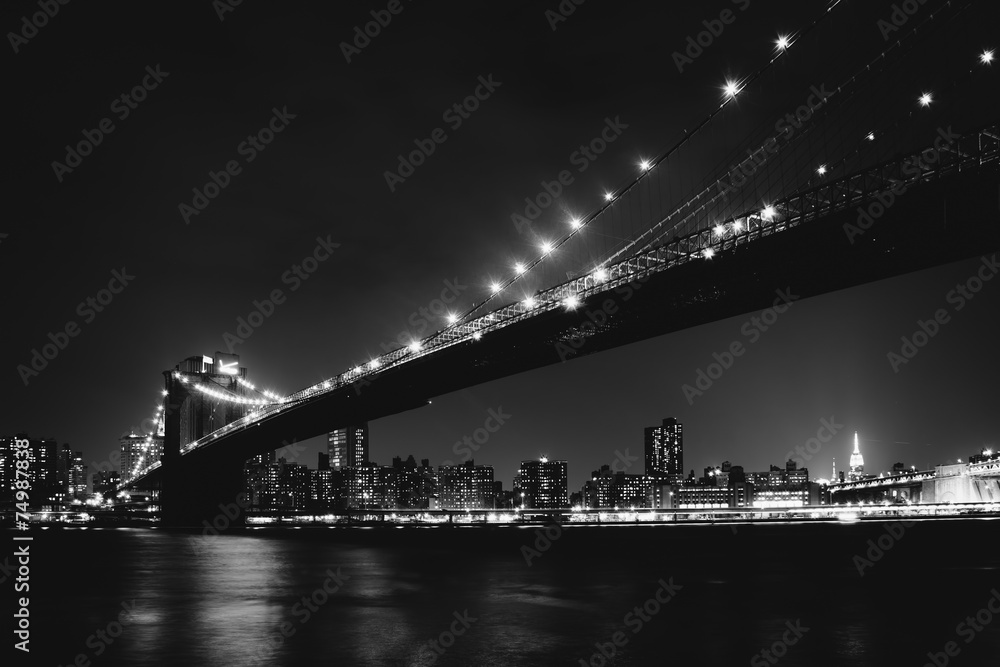 The Brooklyn Bridge at night seen from Brooklyn Bridge Park, New