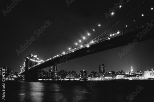 The Brooklyn Bridge at night seen from Brooklyn Bridge Park, New
