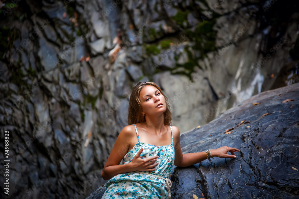 beautiful girl posing in dress at the waterfall beautiful girl posing in dress at the waterfall